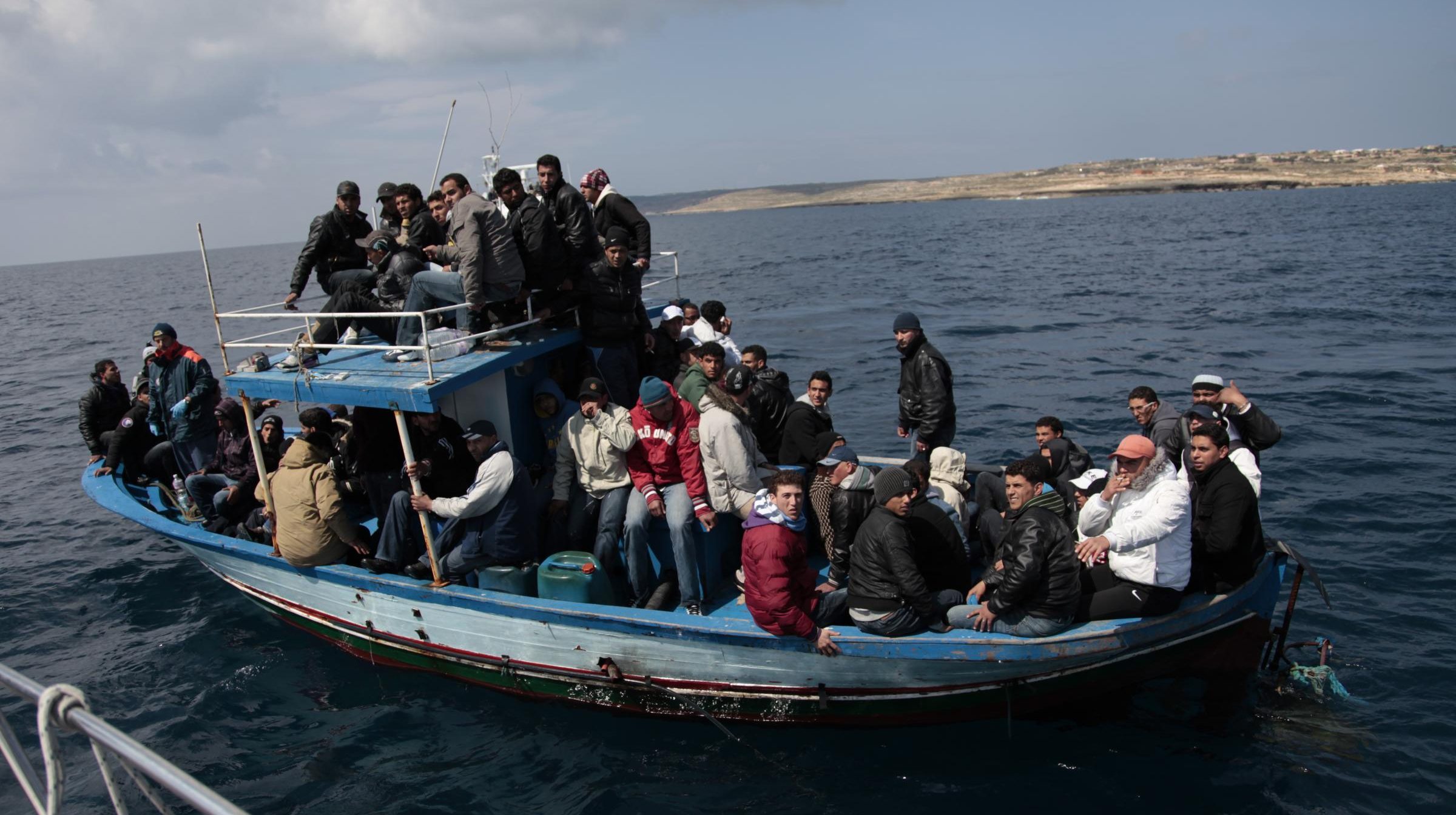 Migranti fuggono dalla Libia