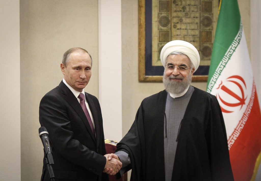 Vladimir Putin e Hassan Rohuani (LaPresse)