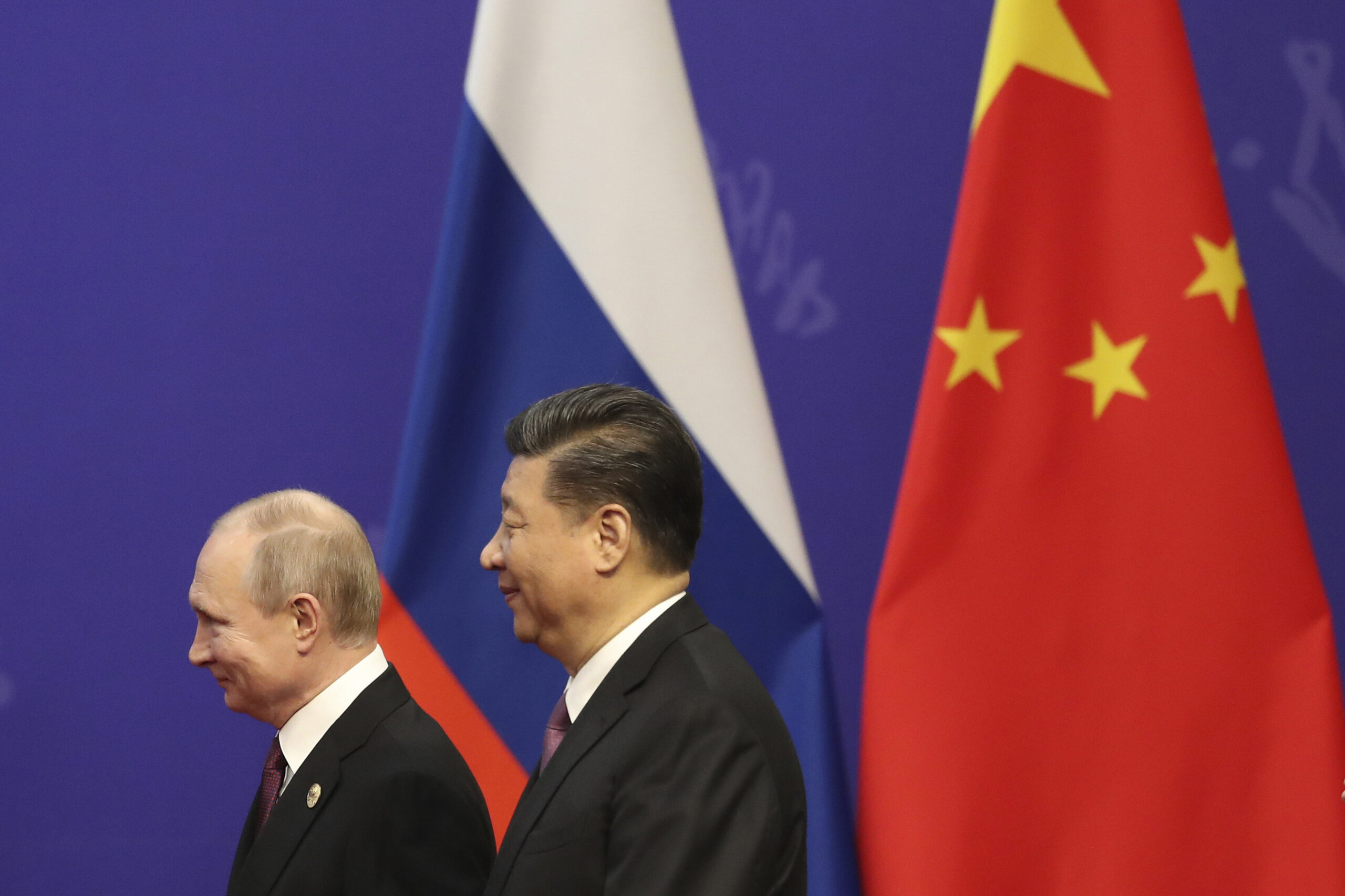 Russian President Vladimir Putin, left, and Chinese President Xi Jinping, right