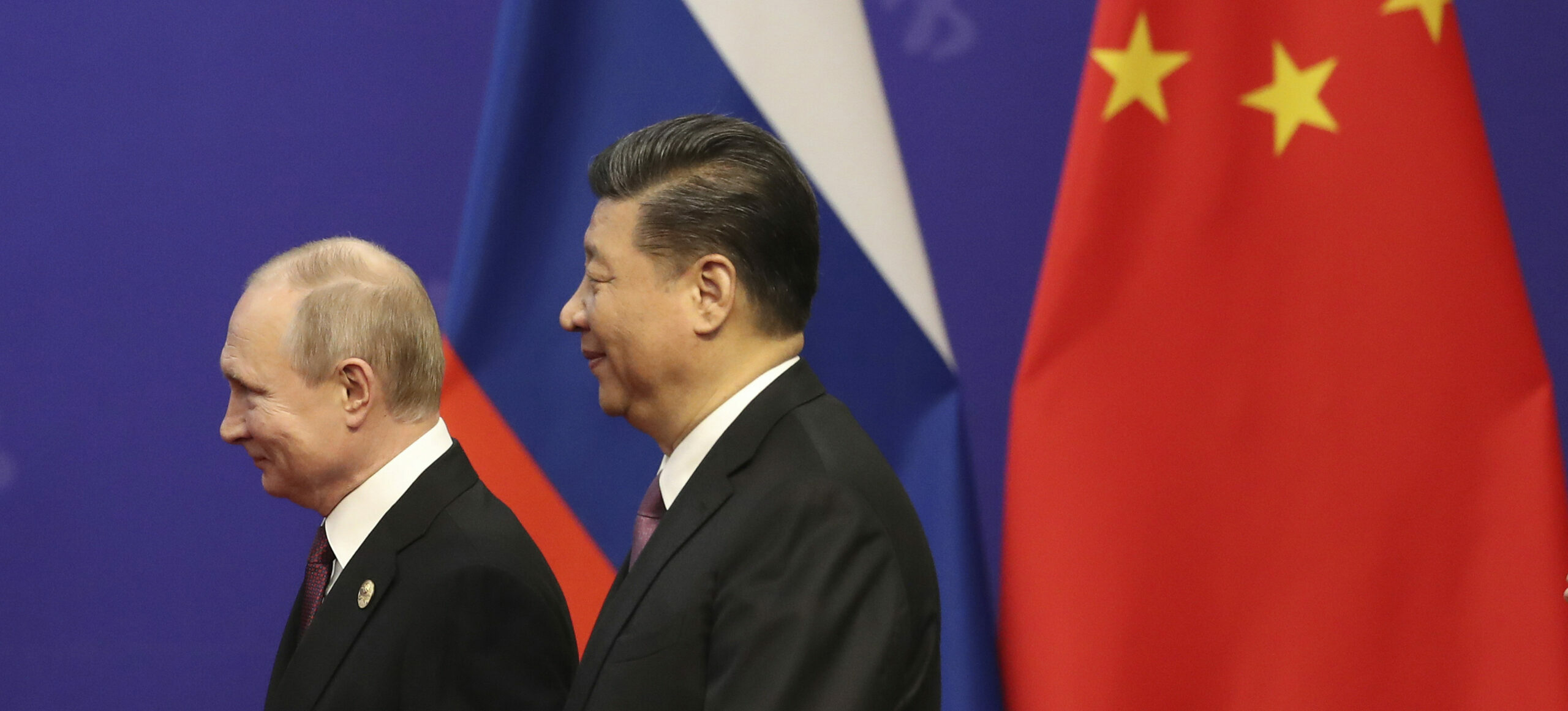 Russian President Vladimir Putin, left, and Chinese President Xi Jinping, right
