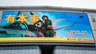 Cina, manifesto militari (ANSA)