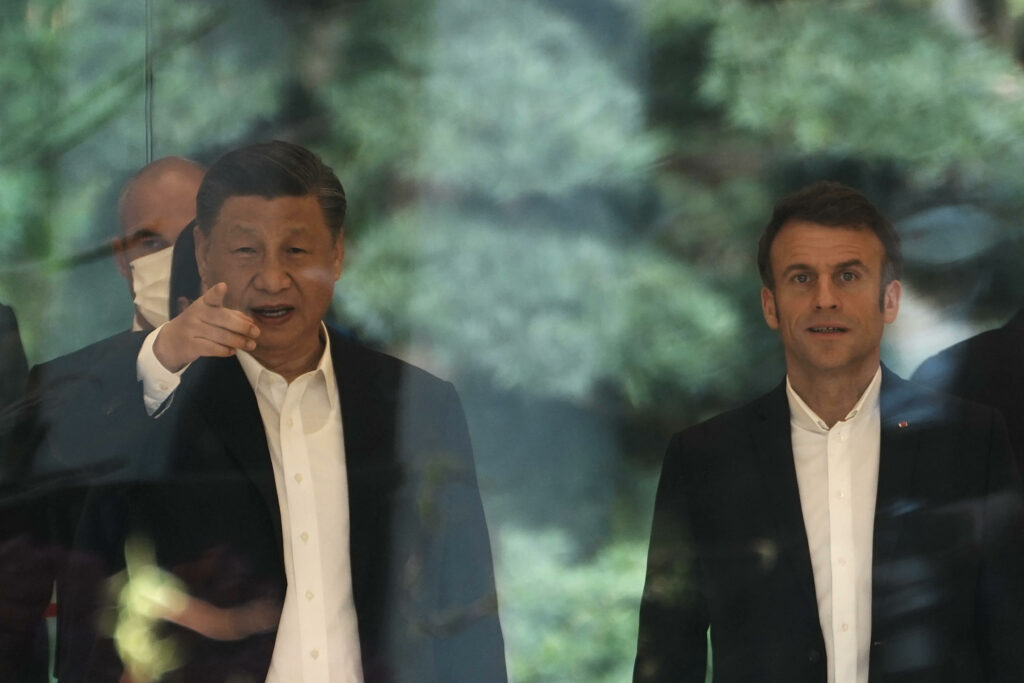 Chinese President Xi Jinping, left, and France's President Emmanuel Macron