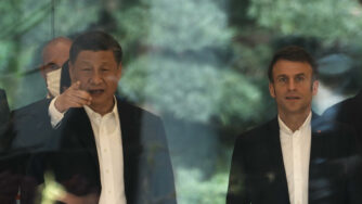 Chinese President Xi Jinping, left, and France's President Emmanuel Macron