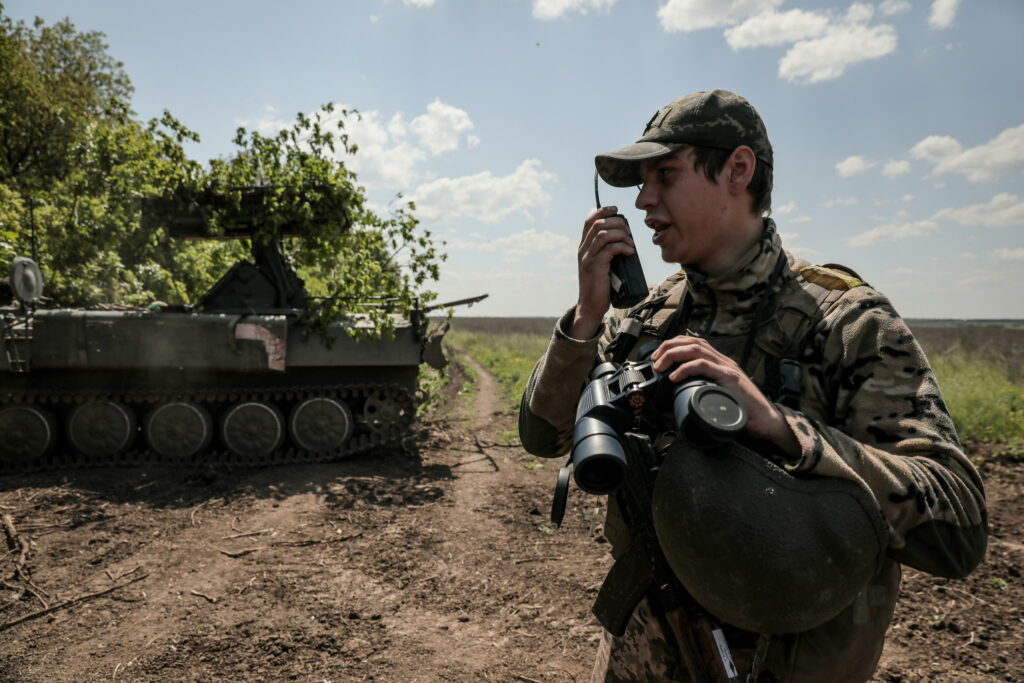 Ukraine servicemen of an anti-aircraft unit of the '24 separate mechanized brigade named after King Danylo' speaks on a radio with operator of Strila anti-aircraft missile launcher at an undisclosed location, in Donetsk region