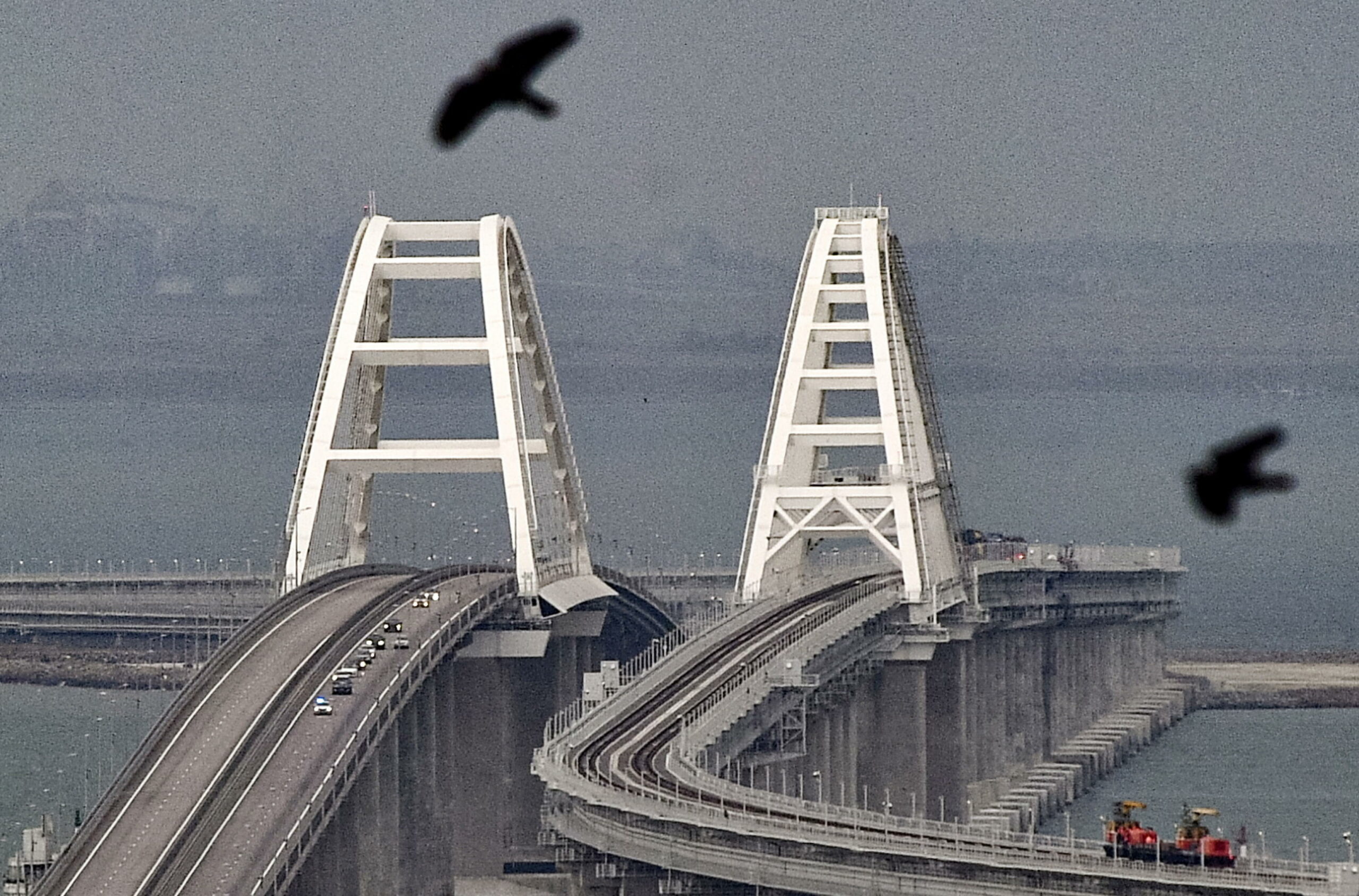 Cars move on the Kerch Strait bridge in Crimea